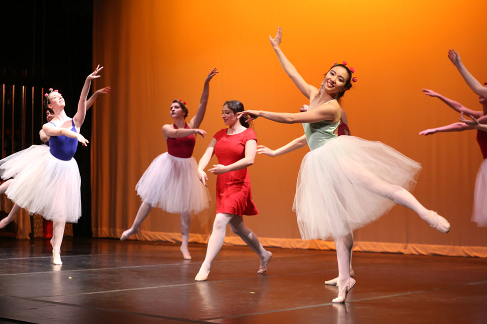 Ballet dancers on stage.